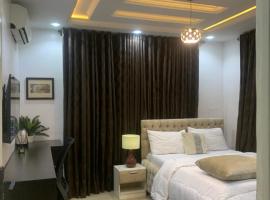 Ozin Retreat And Wellness Home, bed and breakfast en Ikeja