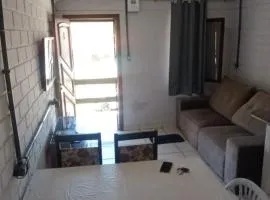 Apartamento com churrasqueira 400 metros da praia