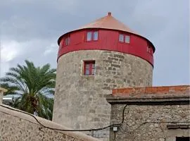 A medieval windmill tower in the heart of old town with magnificent view