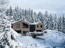 Modernes Architektur-Chalet mit Alpenpanorama