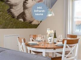 Lotsenkoje Fehmarn mit Balkon & Sauna, perfekt für Familien, отель в городе Бург-ауф-Фемарн