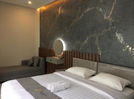 di Turgo Village, hotel en Balong