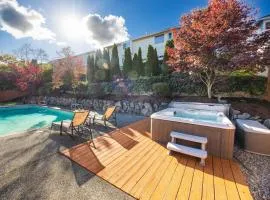 Stylish 4BR retreat with pool & year-round hot tub