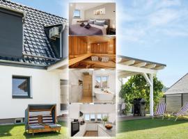 FeelGood Ferienhaus - 212 qm mit Sauna, Garten, Terrasse, Grill - 2 Apartments - für Familien & Gruppen - Mitten in Deutschland, hotel a Schauenburg