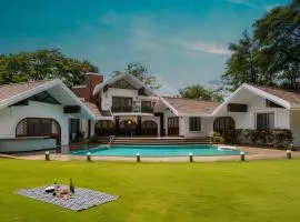 StayVista at Gulmohar Gardens with Gazebo, BBQ