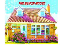The Beach House! Just Steps from the Beach & Attractions - Perfect for Couples & Family Stays with Private Parking, Large Garden & Fast Free WiFi - The Perfect Seaside Getaway to Sutton on Sea, hotel in Sutton on Sea