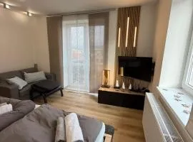 Plně vybavený krásný apartmán 1kk s balkonem, výhledem