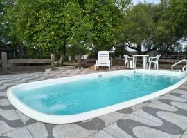 Pousada Espírito Santo - Estamos ubicados a solo 100 metros de la Ruta BR-290, ξενοδοχείο σε Sao Gabriel