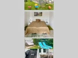 Gemütliche 2 Zimmer Ferienwohnung mit Terrasse Fernsehsessel Spülmaschine Grill Schaukel, fußläufig zu S-Bahn nach München und See, ideal zum Entspannen aber auch zum Arbeiten