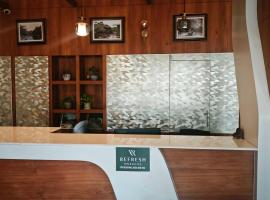 Hotel O REFRESH INN & SUITES, hotel en Tāzhekkod