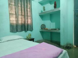 santosh lodge，位于穆扎夫法尔普尔的酒店