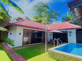 Villas Flora Bella, hótel í Dauis