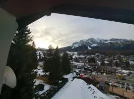 Luminoso e centralissimo attico, splendida vista panoramica sulle Dolomiti e sulle piste olimpiche