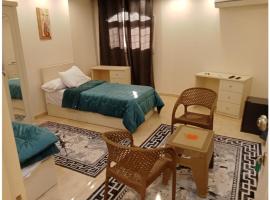 رويال للغرف الفندقية, hotel in Mît Khamîs