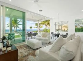 Sunset Point Vacations Luxury Oceanfront Condo with Private Garden West Bay
