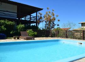 Aucari Chalés, отель в городе Имбитуба