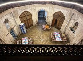 Historical Caravan Sarai XIX century Mekhtar Anbar, Hotel in Buxoro