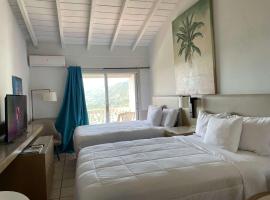 Queen Deluxe Plus at Boundless Bliss Hotel, hotel di Raphune