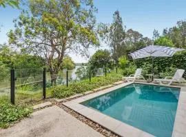 Luxury Riverside Retreat in Benowa