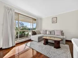 Spacious 4-Bed House with Private Garage