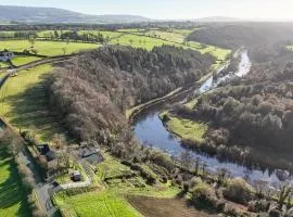 Riverside house with spectacular views