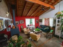 Habitación doble con balcón y pileta en las sierras Unquillo