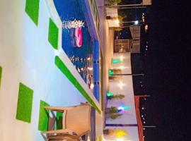 Happy farm, Hotel in Umm Jawzah