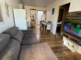 Casa pé na areia em capão da canoa