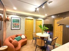 House of Keul - 2BR cozy condo in Dumaguete with pool and free laundry for long term guests up to 4 pax, hotel in Piapi