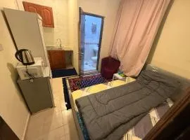 Studio with parking 10 minutes from Zayed Airport Abu Dhabi For Single or Couple travellers