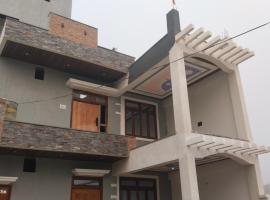 Prayagi, hotel i Prayagraj