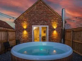 Luxury barn with private wood fired hot tub