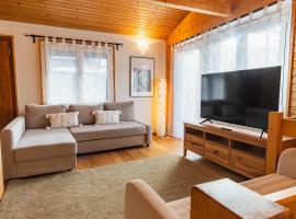 Chalet Flora Mountain view with Private Garden, Hotel in Beatenberg