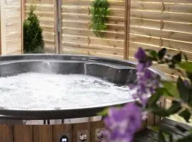 Kominkowy Chill - Jacuzzi, Sauny & Wybrane apartamenty z prywatnym jacuzzi