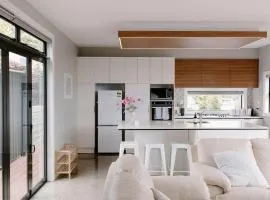 Sunny and Modern Nelson Retreat with Designer Kitchen
