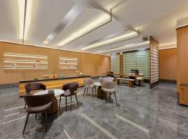 Jinyi Hotel, hotel s parkiri&scaron;čem v mestu Jining