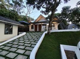 Harsham Homestay, hotel din Pooppara