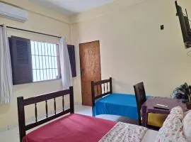 Suíte perto do Centro e de Praias