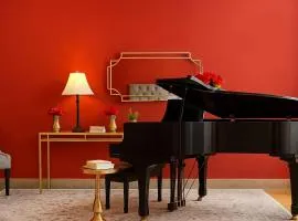The Red Room - Double King Bed - Grand Piano
