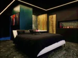 Suite Dark Luxe - Écran géant de cinéma et jacuzzi