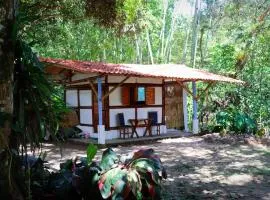 Eco posada El Encuentro San Carlos frente al rio