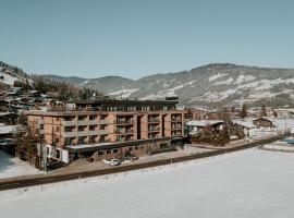 AlpenParks Hotel & Apartment Taxacher, hotel em Kirchberg in Tirol
