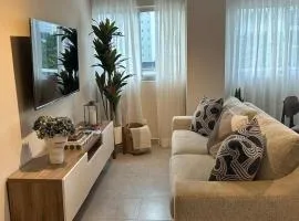 REFA - 404 · Luxury 1BR Suite in Piantini | Modern • Pool • Gym