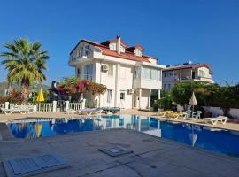 White Villa with Pool , Garden ,Balcony with Amazing panorama, hotell i Fethiye