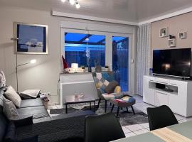 Ferienhaus Dackel am Deich - strandnah - eingezäunter Garten - Ruhe, hotel a Dornumersiel