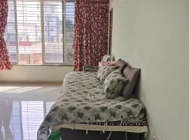 1 big furnished studio apartment with a pantry including fridge, utensils, gas stove and a washing machine with attached bathroom that can accommodate minimum 4 people