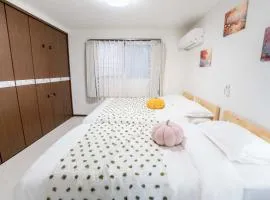 102Room,Free parking just a 7-minute walk from Koiwa tram stop This spacious 75-square-meter flats features two large bedrooms and can accommodate up to seven guests