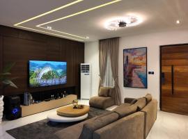 Dan Homes, hotel con estacionamiento en Mama