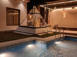 Pool Chalet W Green Garden & BBQ Relax，利雅德的飯店