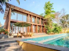 ELIVAAS The Glass Villa - An ultra-luxurious 4-BHK villa with an infinity pool